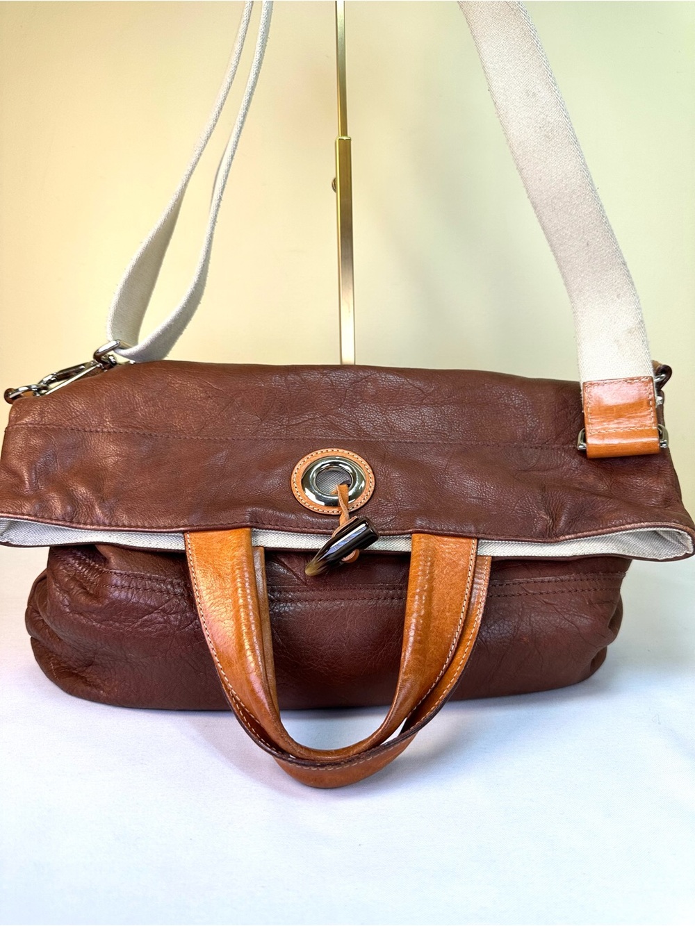 Maurizio Taiuti Luxury Italian heritage brown Leather foldover wooden closure